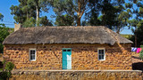 Old stone thatched cottage