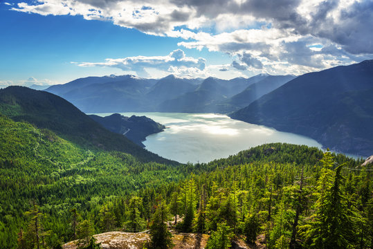 scenic view of howe sound and the surrounding mountains on a summer day. squamish, bc, canada.
