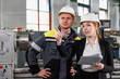 © ProstoSvet - Young female engineer using clipboard.Female quality inspector at factory