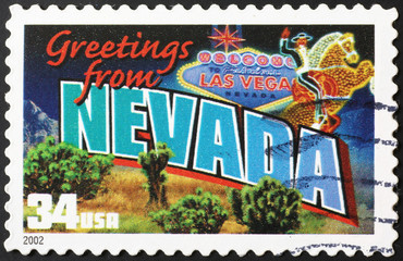 Wall Mural - Greetings from Nevada postcard on stamp