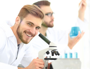 Wall Mural - male researcher carrying out scientific research in a lab