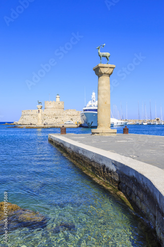 Fotografija Mandarki harbor entrance of Rhodes, Dodecanese, Greece