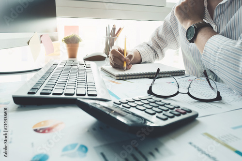 Cuadros en Lienzo Bookkeeper or financial inspector hands making report, calculating
