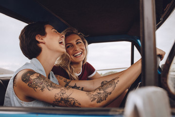 Girls having fun on road trip