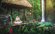 Serenity and yoga practicing at waterfall,Bali,Imdonesia