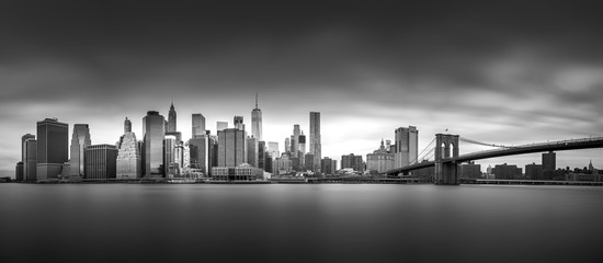 NEW YORK, UNITED STATES OF AMERICA - APRIL 30, 2017: Manhattan downtown skyline from the Brooklyn Bridge Park in New York City.