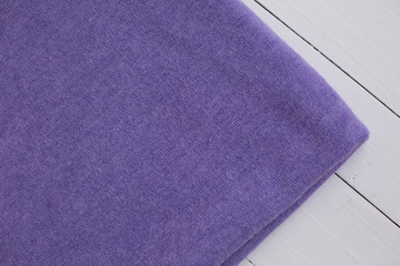 background texture. purple color knitted fabric on white background