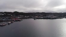 Aerial Shot Approaching Oban Town From The Bay