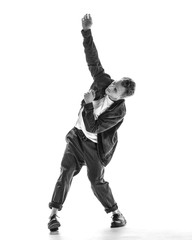 Young beautiful dancer posing in the studio