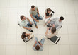 © ASDF - top view.business team discussing current issues