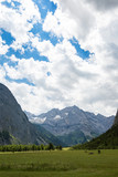 Fototapeta Góry - spring landscape, mountain valley, vertical photo, spring landscape, mountain valley, vertical photo