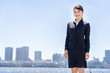 © taka - portrait of asian businesswoman in blue sky