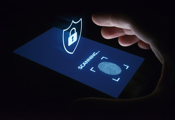 Wall Mural - fingerprint scan provides security access with biometrics identification. business technology safety
