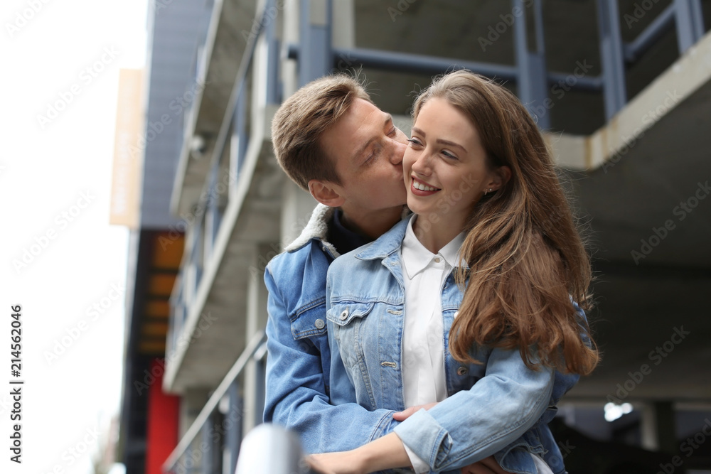 Happy young couple in love outdoors