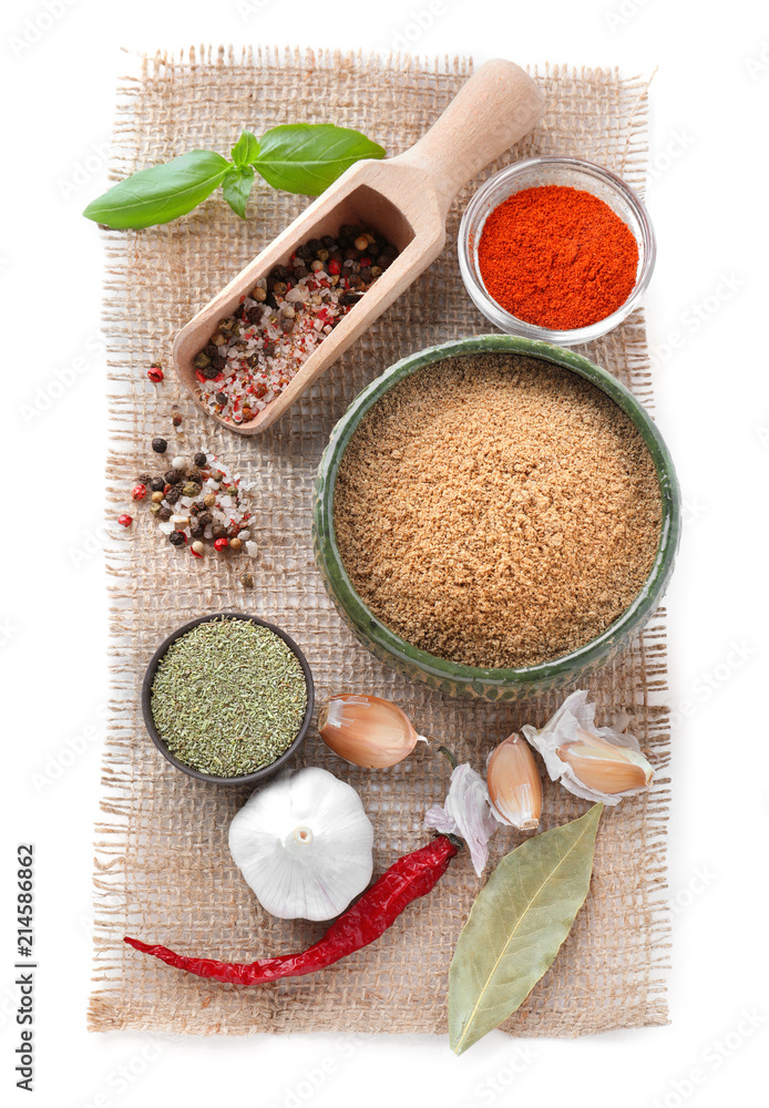 Composition with different spices on white background