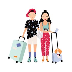 young male and female tourists dressed in trendy clothing standing together and holding suitcases. t