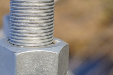 A nut and bolt close up