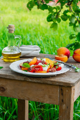 Wall Mural - Summer peach tomato salad