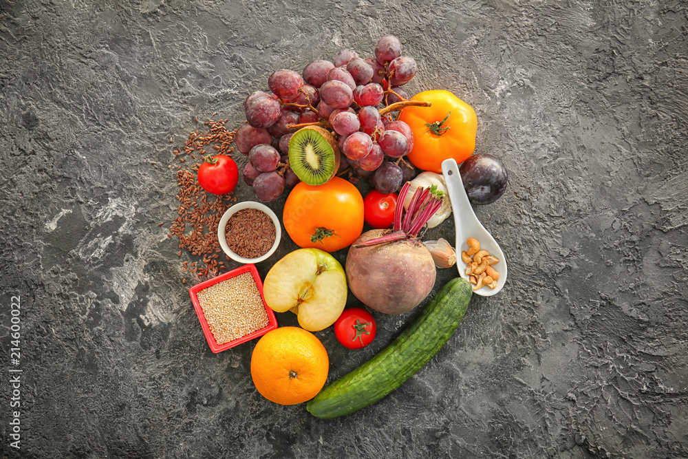 Various healthy products on grey background