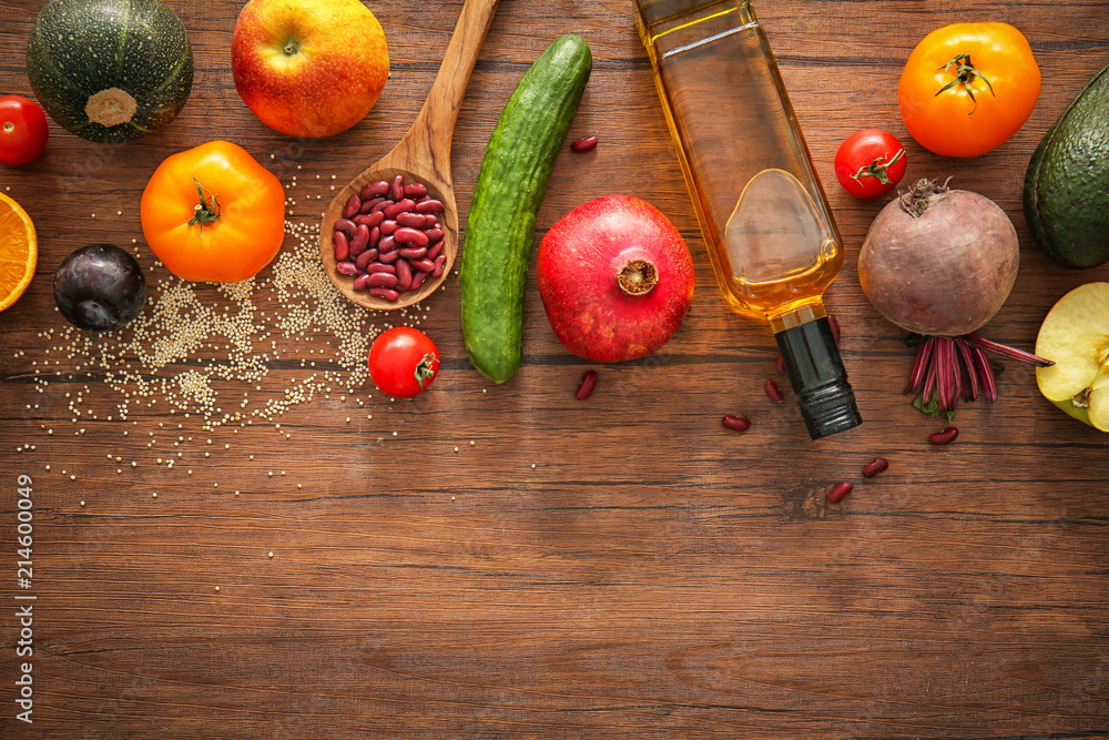 Composition with various healthy products on wooden background