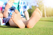 © Pixel-Shot - Cute little boy relaxing in park on sunny day