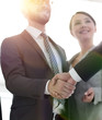 © ASDF - business leader shaking hands with the investor