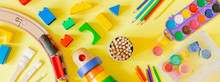 Day Care Concept - Art Supplies And Toys On Bright Background