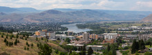 Aerial Panoramic View Of Kamloops City During A Cloudy Summer Day. Located In Interior BC, Canada.