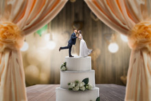 Wedding Cake With Bride And Groom On The Top