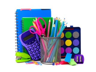 Wall Mural - Colorful assortment of school supplies in a cluster isolated on a white background