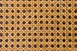 Close up of the pattern formed by open weave rattan cane