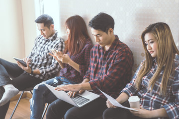 Wall Mural - Casual home worker sitting in a row in team meeting