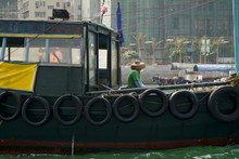  Sampan In Aberdeen Harbor, Hong Kong. Sampan Rides Are A Popular Tourist Activity In Aberdeen Harbor Because Of The Close Proximity To The Working Fishing Boats And The Fishermen Who Work There.