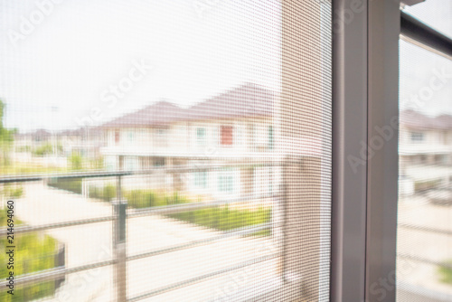 Fotomural mosquito net wire screen on house window protection against insect