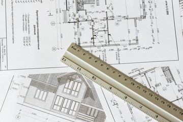 Wall Mural - The architectural plan of the house is printed on a white sheet of paper. A ruler on it. June 2018, Russia, Moscow