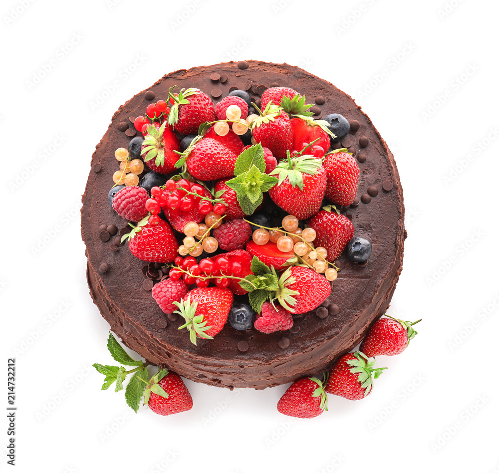 Tasty chocolate cake decorated with fresh berries on white background