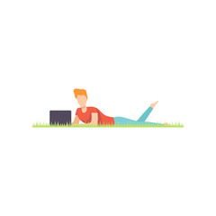 Canvas Print - Young man lying on the grass with laptop, remote working, freelance concept vector Illustration on a white background