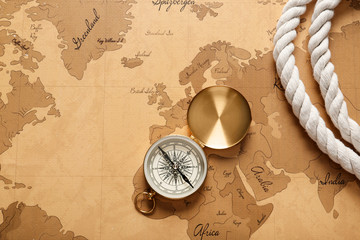 Sticker - Vintage compass with rope on world map