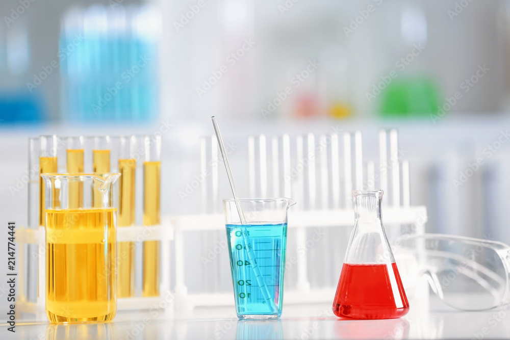 Chemical glassware on table in laboratory