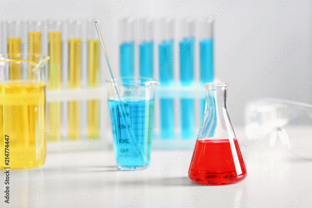 Chemical glassware on table in laboratory
