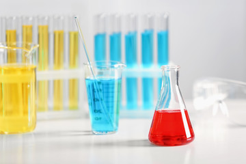 Chemical glassware on table in laboratory