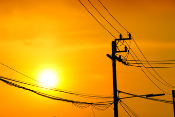 High-voltage tower at sky background,high voltage post at sky backgound, Silhouette of pylons,Electricity pylons and lines