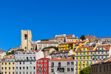 Poster - Colorful houses in city of Lisbon, Portugal.