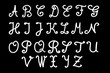 White hand written alphabet on blackboard texture background