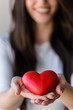 © lordn - Red Heart on Woman's Palms. Love Symbol. World Heart Day