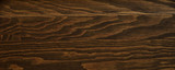 Fototapeta  - Dark brown wooden texture.
