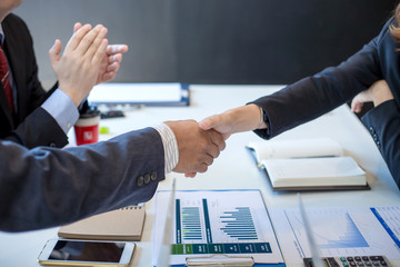 Business people shaking hands. Congratulations and success of the business.