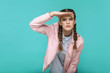 © khosrork - looking too far. portrait of beautiful cute girl standing with makeup and brown pigtail hairstyle in striped light blue shirt pink jacket. indoor, studio shot isolated on blue or green background.