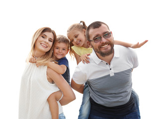 Canvas Print - Happy family spending time together with their children outdoors