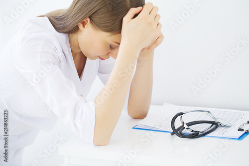Fotografia Clinic. Portrait of young doctor standing in medical office